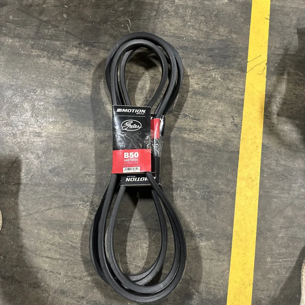 Gates B50 V-belt coiled on the warehouse floor with its Motion Industries label