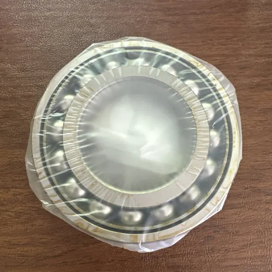 NTN SKF-7213BG angular contact ball bearing, still in its protective wrap